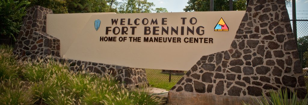 U.S. Army Fort Benning sign reading, "Welcome to Fort Benning Home of the Maneuver Center"