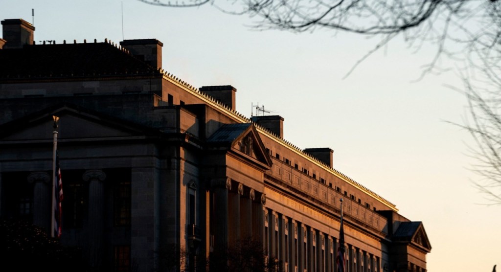 Department of Justice building against twilgiht sky