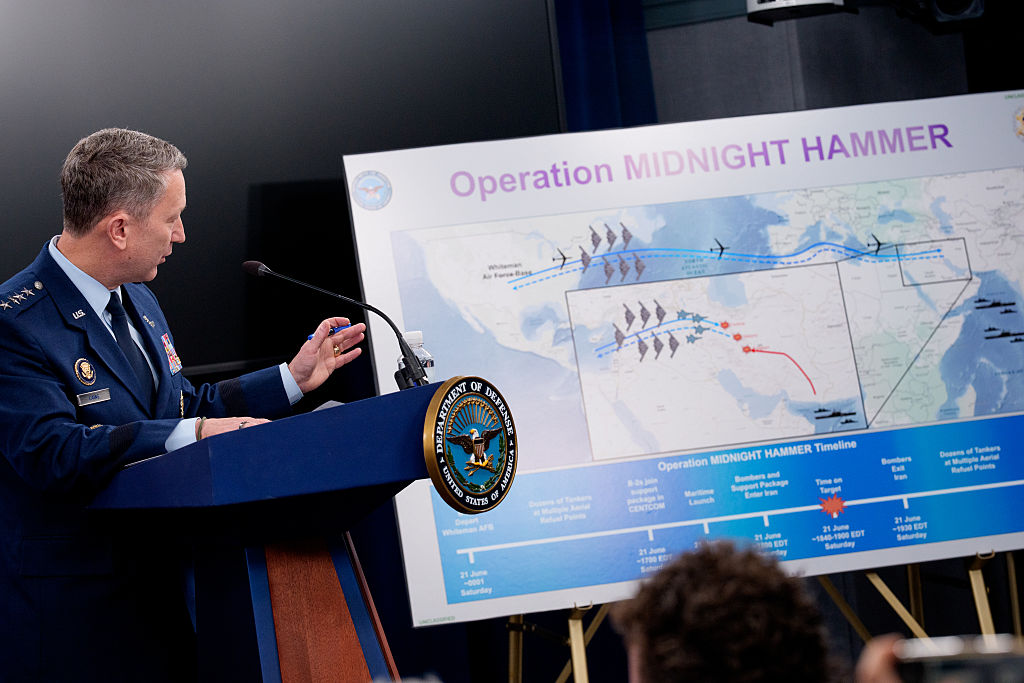 Chairman of the Joint Chiefs of Staff Air Force Gen. Dan Caine discusses the mission details of a strike on Iran during a news conference at the Pentagon on June 22, 2025 in Arlington, Virginia. U.S. President Donald Trump gave an address to the nation last night after three Iranian nuclear facilities were struck by the U.S. military. In the image he is showing the media a graphic that describes the timeline of the operation. (Photo by Andrew Harnik/Getty Images)