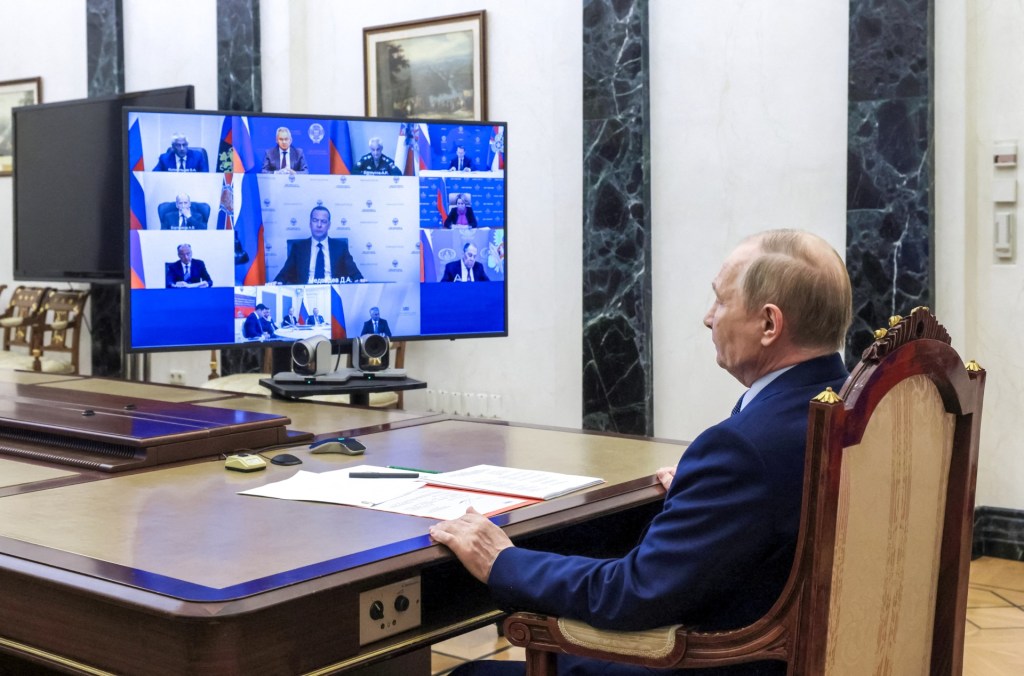 In this pool photograph distributed by the Russian state agency Sputnik, Russia's President Vladimir Putin chairs a Security Council meeting via a videoconference at the Kremlin in Moscow on July 25, 2025. (Photo by SERGEI ILYIN/POOL/AFP via Getty Images)