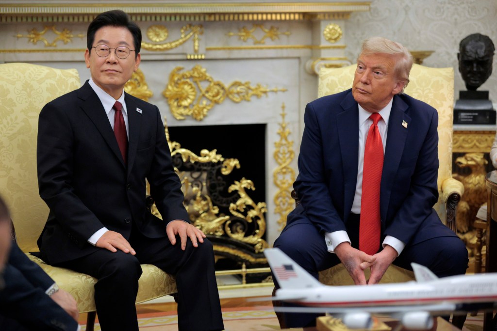 U.S. President Donald Trump (R) and South Korean President Lee Jae-myung talk to reporters before an Oval Office meeting at the White House on August 25, 2025 in Washington, DC. During Lee's first official visit to the White House, the two leaders are set to discuss trade and military cooperation to counter North Korea and China, South Korea's top trade partner. (Photo by Chip Somodevilla/Getty Images)