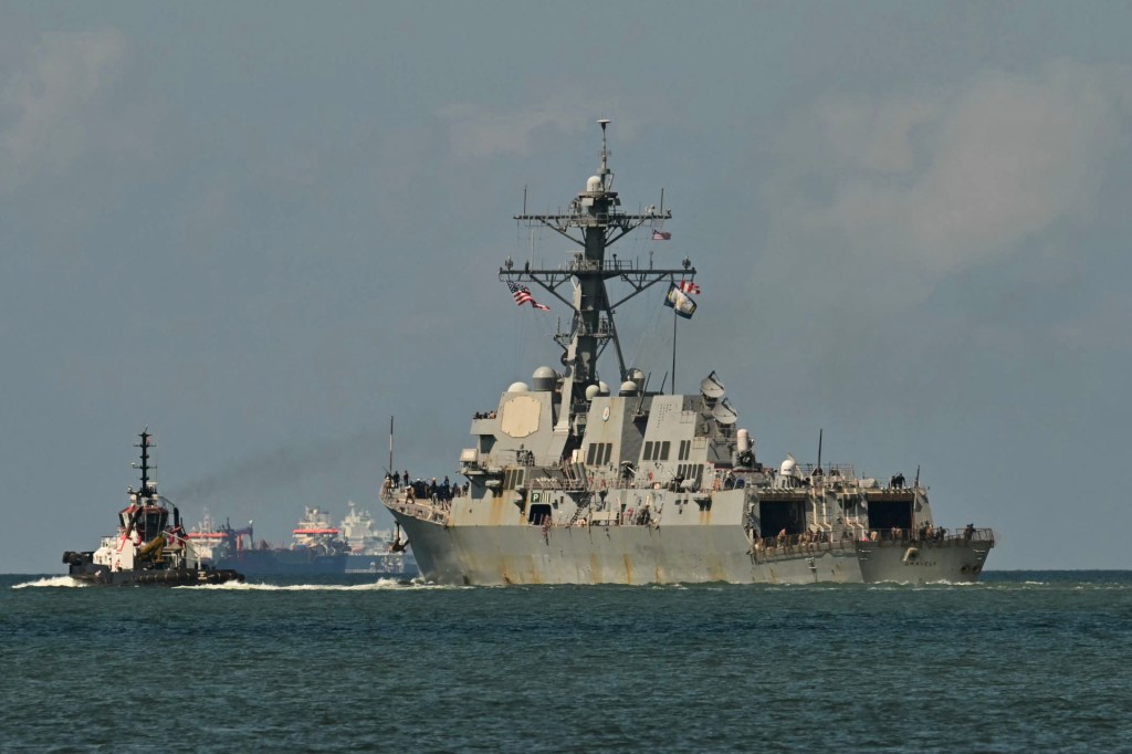 The USS Gravely, a US Navy warship, departs the Port of Port of Spain on October 30, 2025. The US warship arrived in Trinidad and Tobago on October 26, 2025, for joint exercises near the coast of Venezuela, as Washington ratcheted up pressure on drug traffickers and Venezuelan leader Nicolas Maduro. (Photo by MARTIN BERNETTI/AFP via Getty Images)