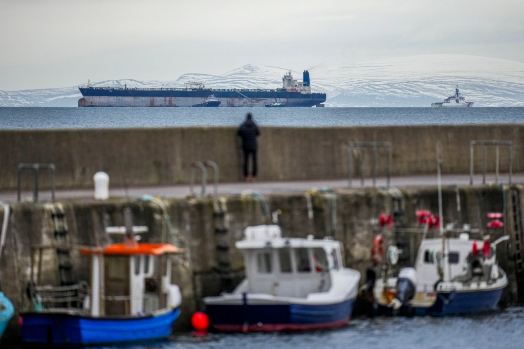 The Marinera oil tanker is seen on January 14, 2026 in Hopeman, Scotland. The Marinera oil tanker, previously known as the Bella 1, has entered UK waters at the request of the US to be replenished with "essential supplies." The Russian-flagged tanker was seized by US forces on 7 January 2026, between Iceland and Scotland, for allegedly violating sanctions by transporting oil for Venezuela, Russia, and Iran. (Photo by Peter Summers/Getty Images)