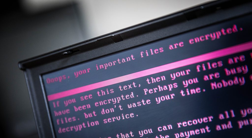A laptop displays a message after being infected by a ransomware as part of a worldwide cyberattack on June 27, 2017 in Geldrop.