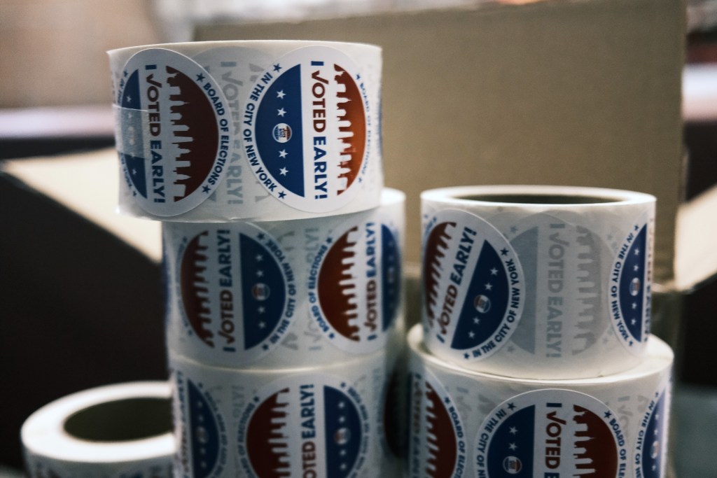 'I voted early' stickers sit on a table at the Brooklyn Armory during early voting on October 28, 2020 in New York City.