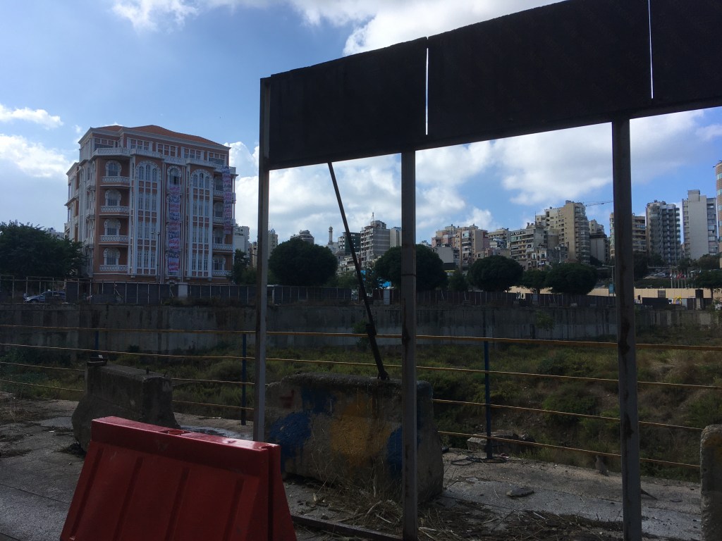 The State Council building in downtown Beirut on Oct. 29, 2019 as seen from a distance at the height of protests against Lebanon's ruling class. Banners unfurled from its windows contain pro-revolutionary slogans.