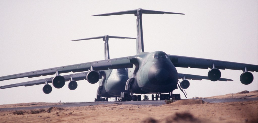 ILE PHOTO: C-5s are parked on the flight line, soon to be on their way to Mogadishu, Somalia. (Photo by USAF)